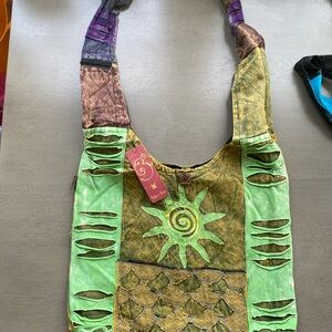 Handcrafted Green Patchwork Boho Shoulder Bag with Sun Motif
